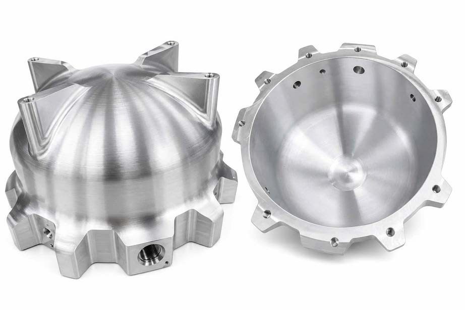 Precision machined round housings