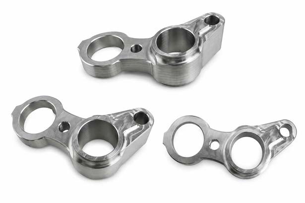 Precision machined linkage components